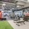 Fitness center at Hermann Park Lofts featuring free weights, strength training equipment, turf area, and functional workout space.