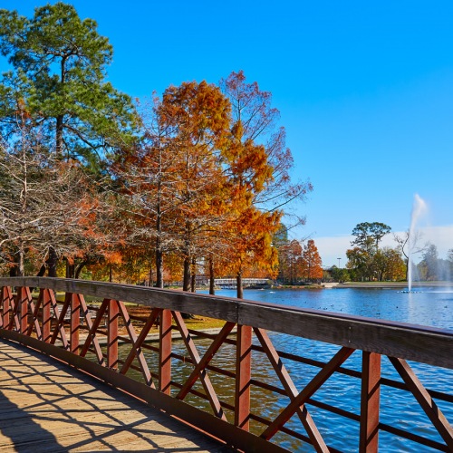 Nice bridge at Hermann Park, Houston, Texas View of nearby lake on a walk path bridge