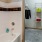 Bathroom with tiled bathtub and direct access to walk-in closet with shelving at Hermann Park Lofts.